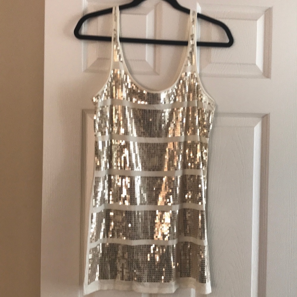 Beige cotton tank top with gold sequins.